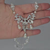 Chandelier pearl necklace for the bride.