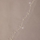 Pearl Wave Fingertip Bridal Veil Delicate floral trim on a beige background