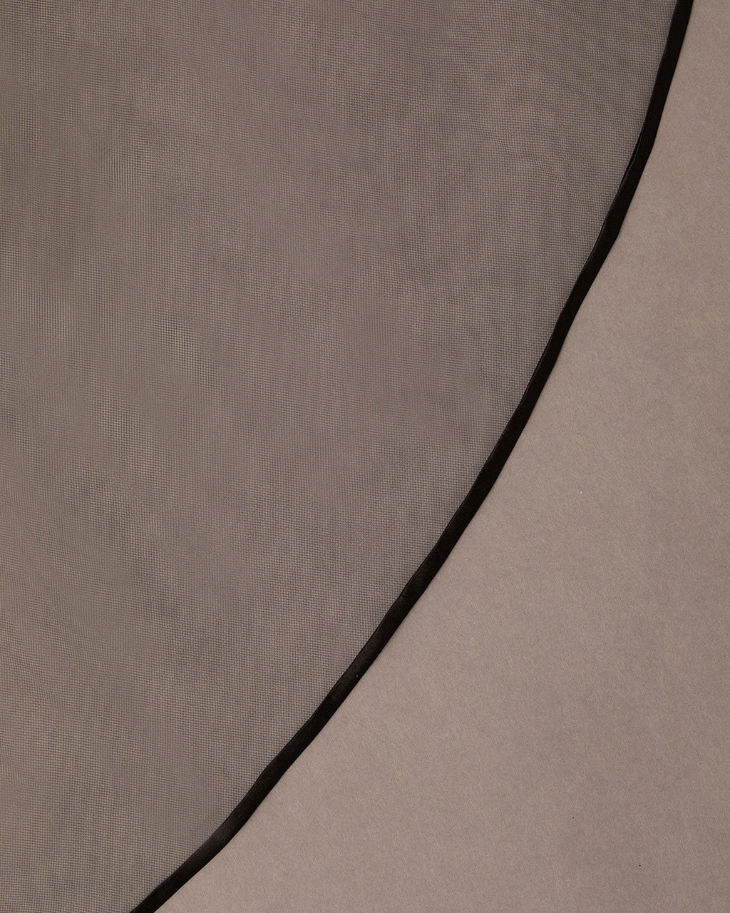 Close up of black wedding veil with satin ribbon trim