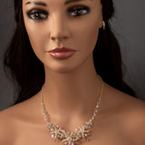 Three crystal covered starfish are surrounded by crystal stones and beads for a sparkly look. Matching bracelet here.