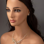 Three crystal covered starfish are surrounded by crystal stones and beads for a sparkly look. Matching bracelet here.