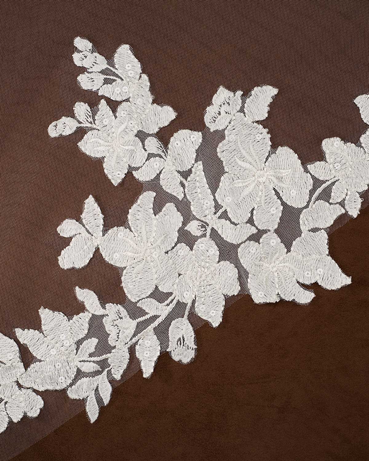 Royal Cathedral Veil with Flower Appliques and Sequins Cassandra Lynne - floral lace applique with embroidered flowers and leaves on a sheer mesh backing, displayed against a dark brown background.