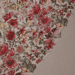 Cathedral Wedding Veil with Burgundy Flower Lace Close-up of intricate floral embroidery with red and gold flowers on a textured fabric background.