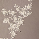Ivory Luxe Tulle Lace Trim Royal Cathedral Bridal Veil Decorative floral lace pattern on a beige background