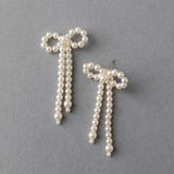 Ivory Pearl Bow Earrings - Earrings - Cassandra Lynne