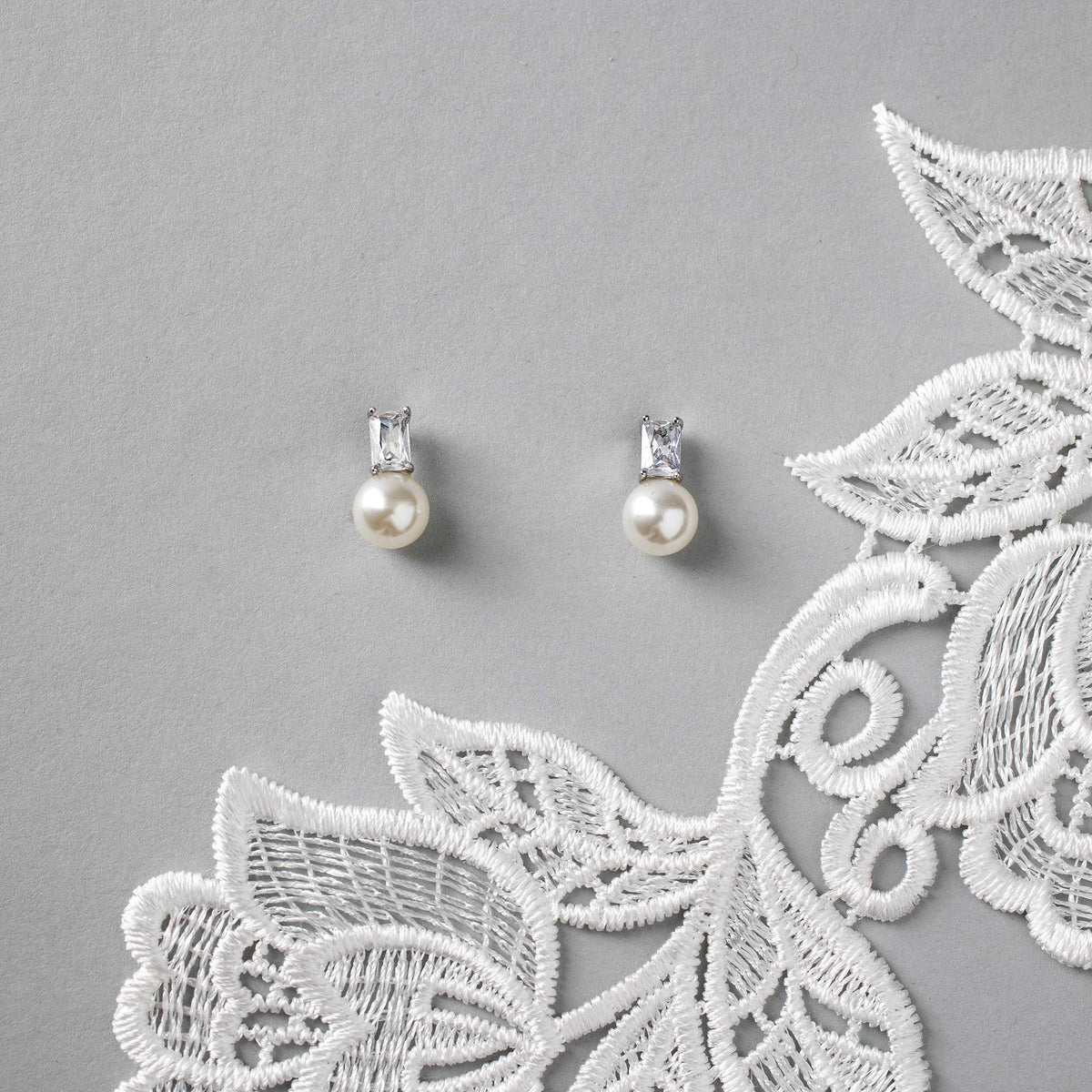 Emerald Accented Pearl Stud Earrings