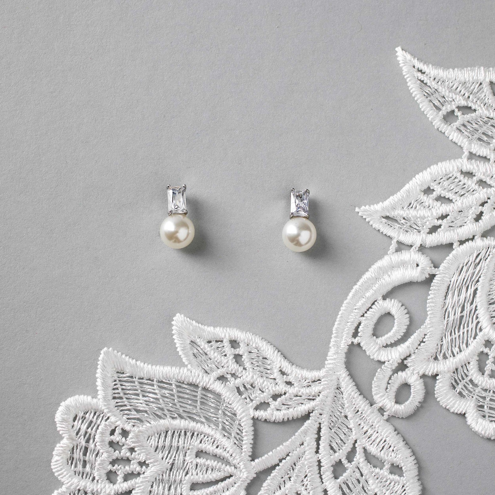 Emerald Accented Pearl Stud Earrings