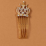 Regal Styled Small Wedding Hair Comb Gold-plated hair comb with clear rhinestones on a textured tan background.