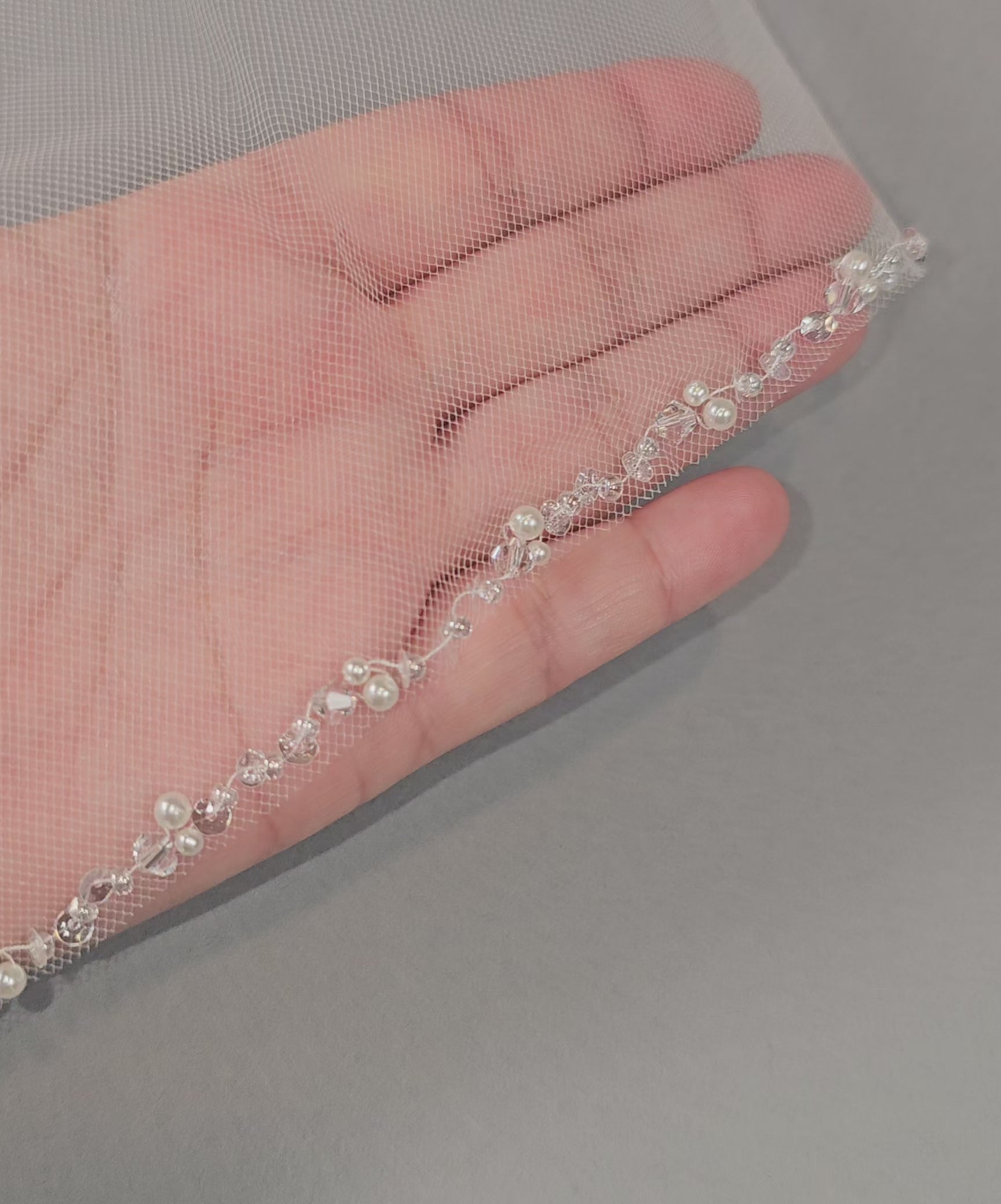 wedding veil detail of crystal beads pearls