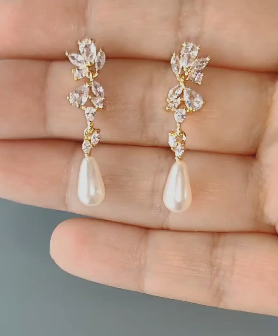 dainty teardrop pearl earrings in gold