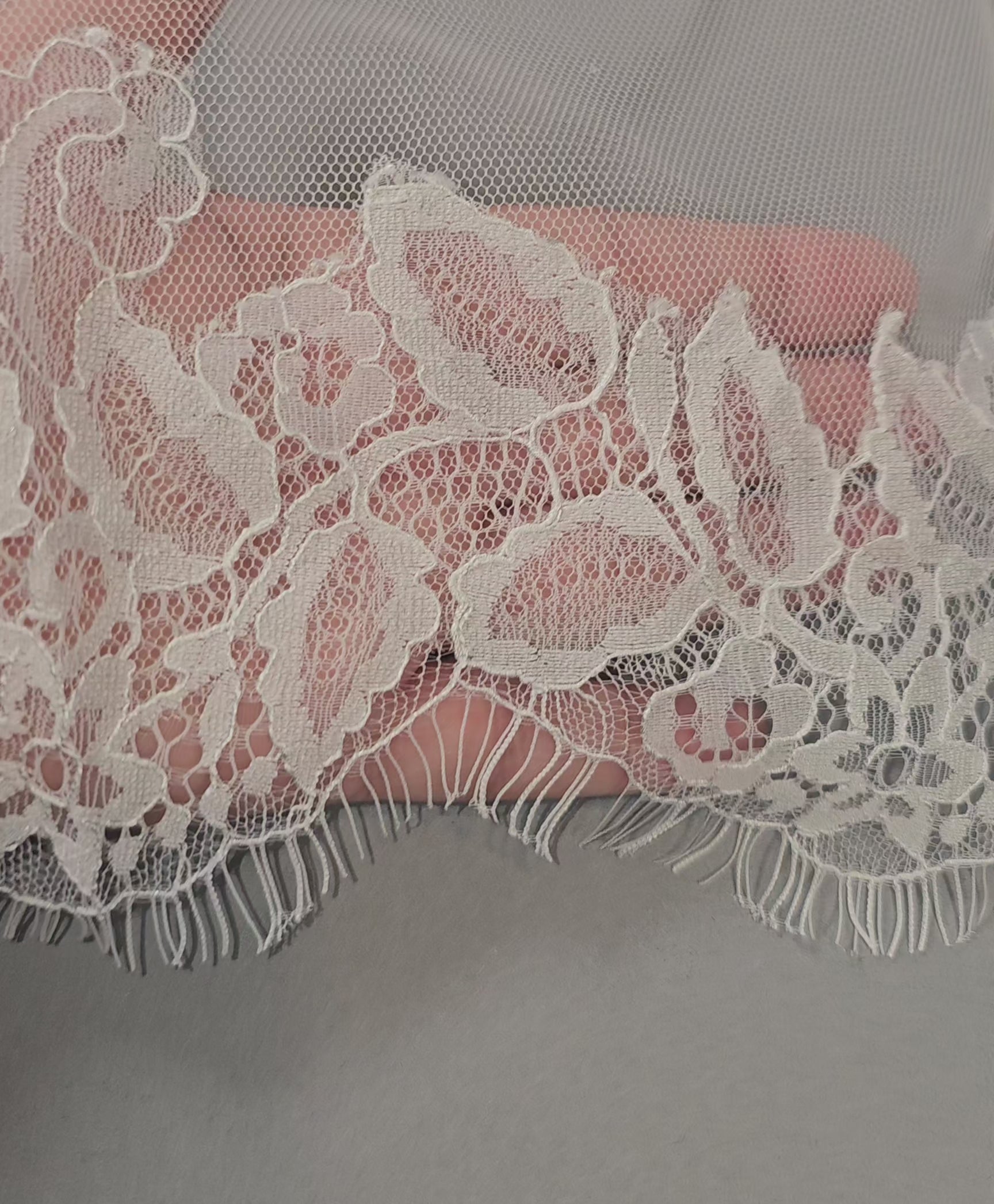 Ivory chantilly lace leaves detail