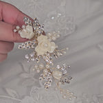 light gold bridal hair clip with porcelain flowers ivory pearls and crystal leaves