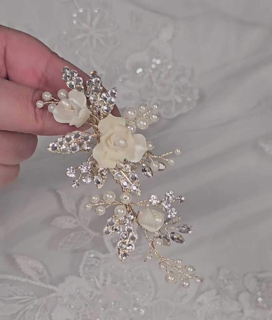 light gold bridal hair clip with porcelain flowers ivory pearls and crystal leaves