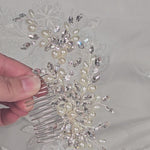silver wedding hair comb with oval shaped ivory pearls and marquise rhinestones