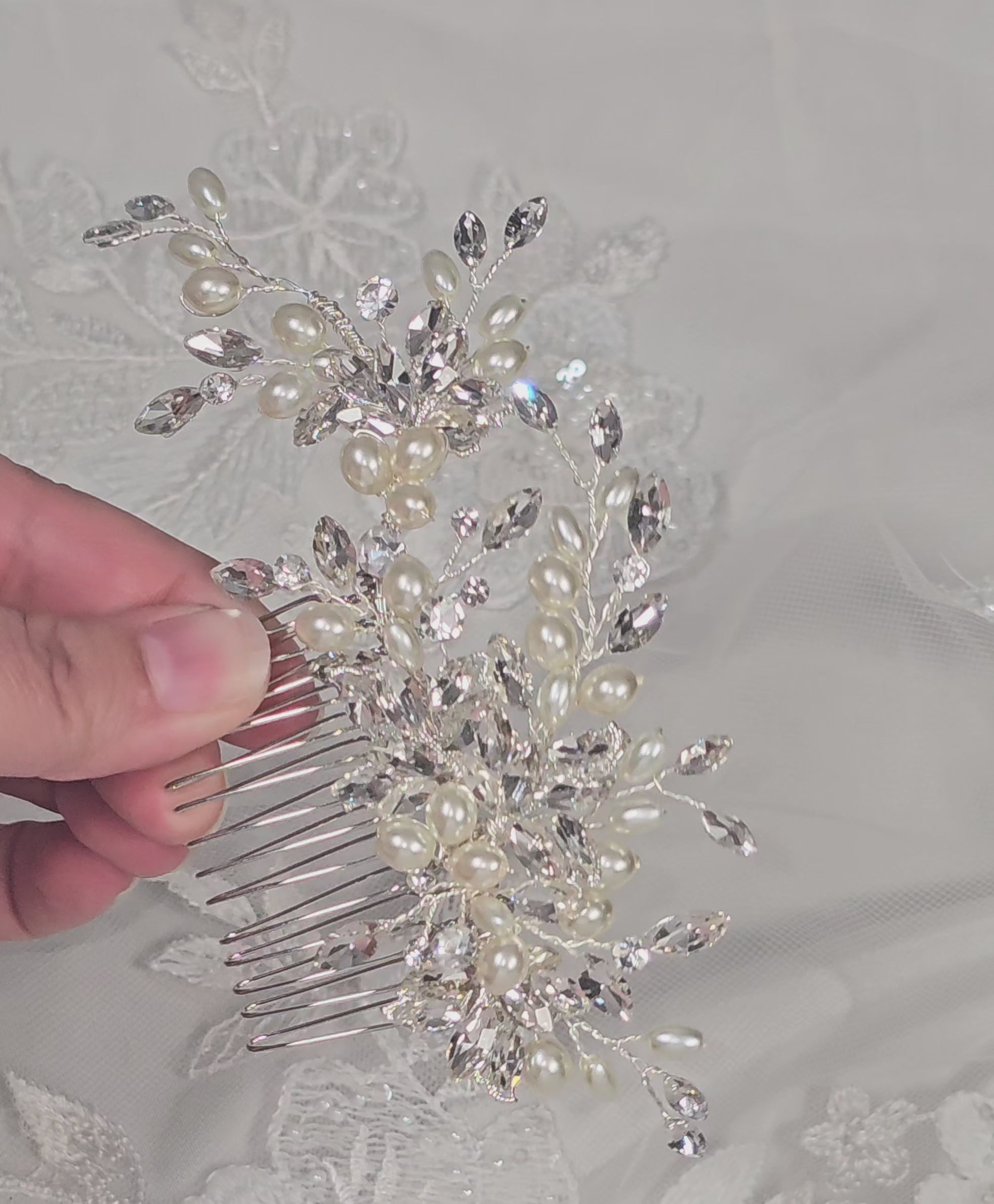 silver wedding hair comb with oval shaped ivory pearls and marquise rhinestones