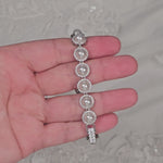 Silver bracelet with pave set ivory pearls and a jeweled clasp