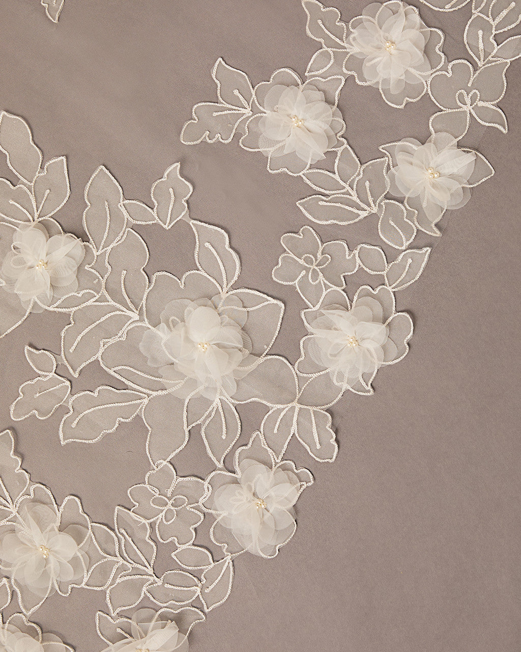 Close-up of floral lace on a beige background Partial Lace and Organza Flowers Cathedral Wedding Veil