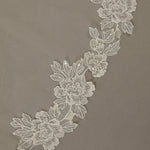 Sequined Lace Bridal Veil Royal Cathedral Length Decorative floral lace trim on a brown background