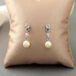 Simple pearl and crystal deep earrings