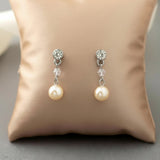 Simple pearl and crystal deep earrings