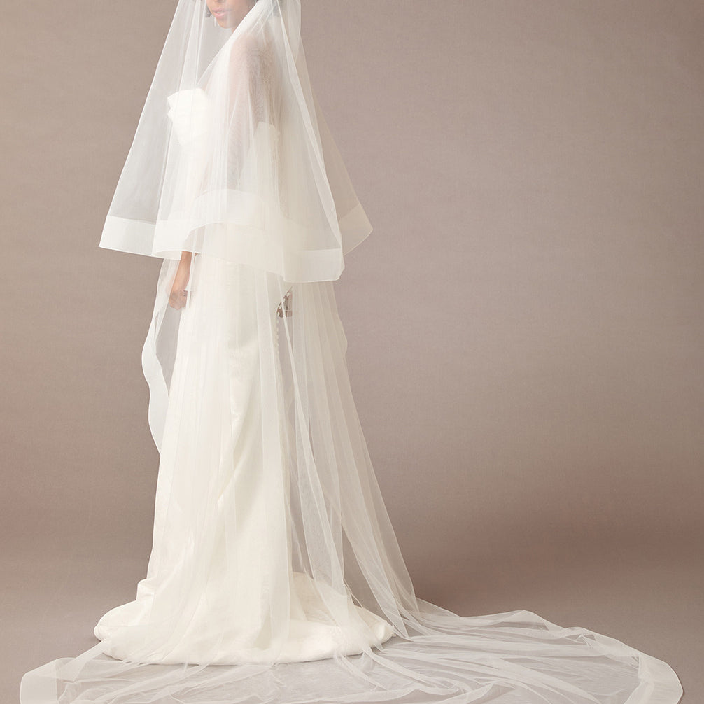 Royal Cathedral Horsehair Trim Two Layer Veil 3 inch ribbon wedding dress with a long veil on a brown background