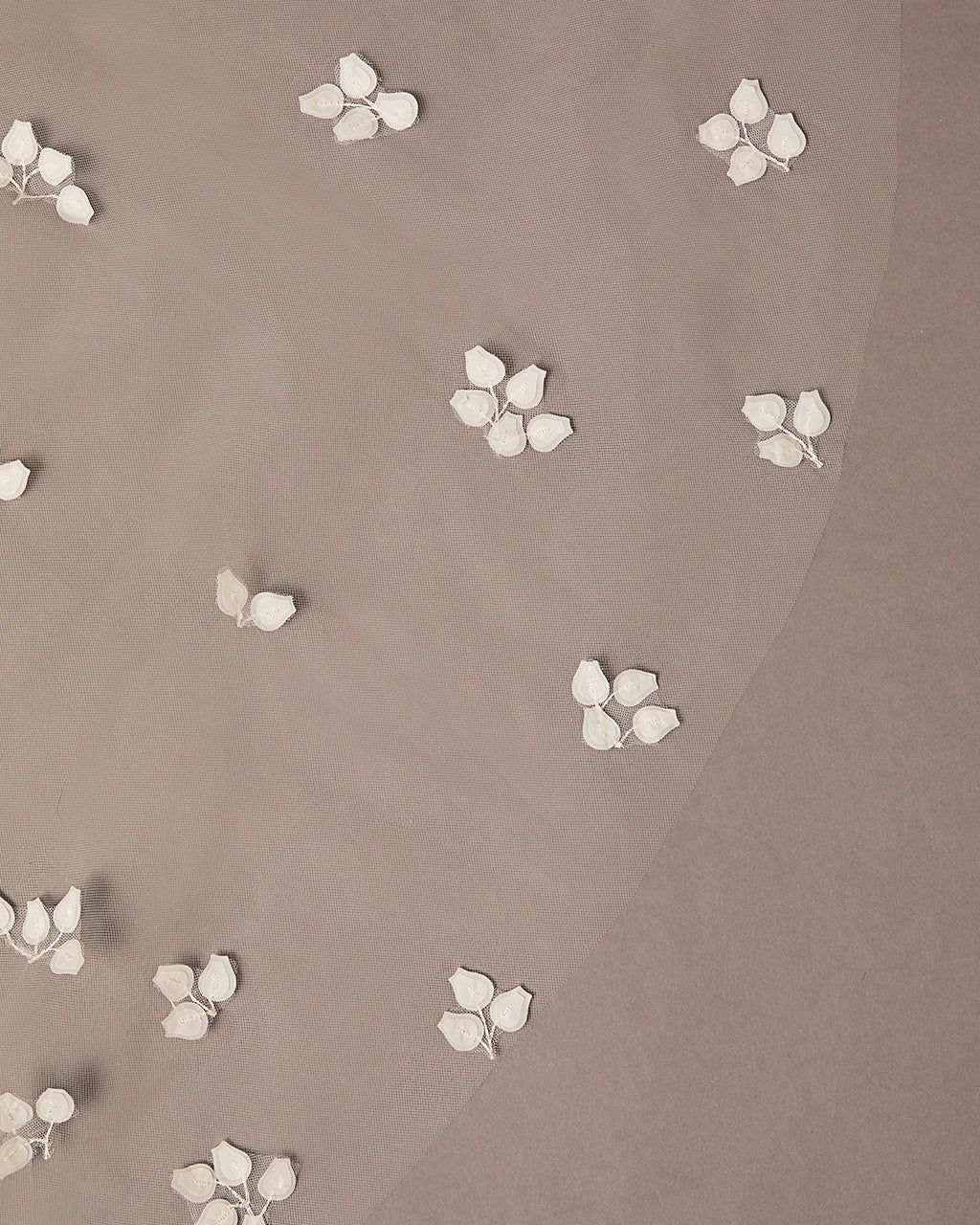 Clover Cut Regal Cathedral Veil with Organza Vines Small  floral patterns on a beige background