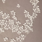 Clover Cut Regal Cathedral Veil with Organza Vines floral branches on a beige background