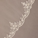  Waltz Wedding Veil with Alencon Lace Decorative lace trim on a brown background